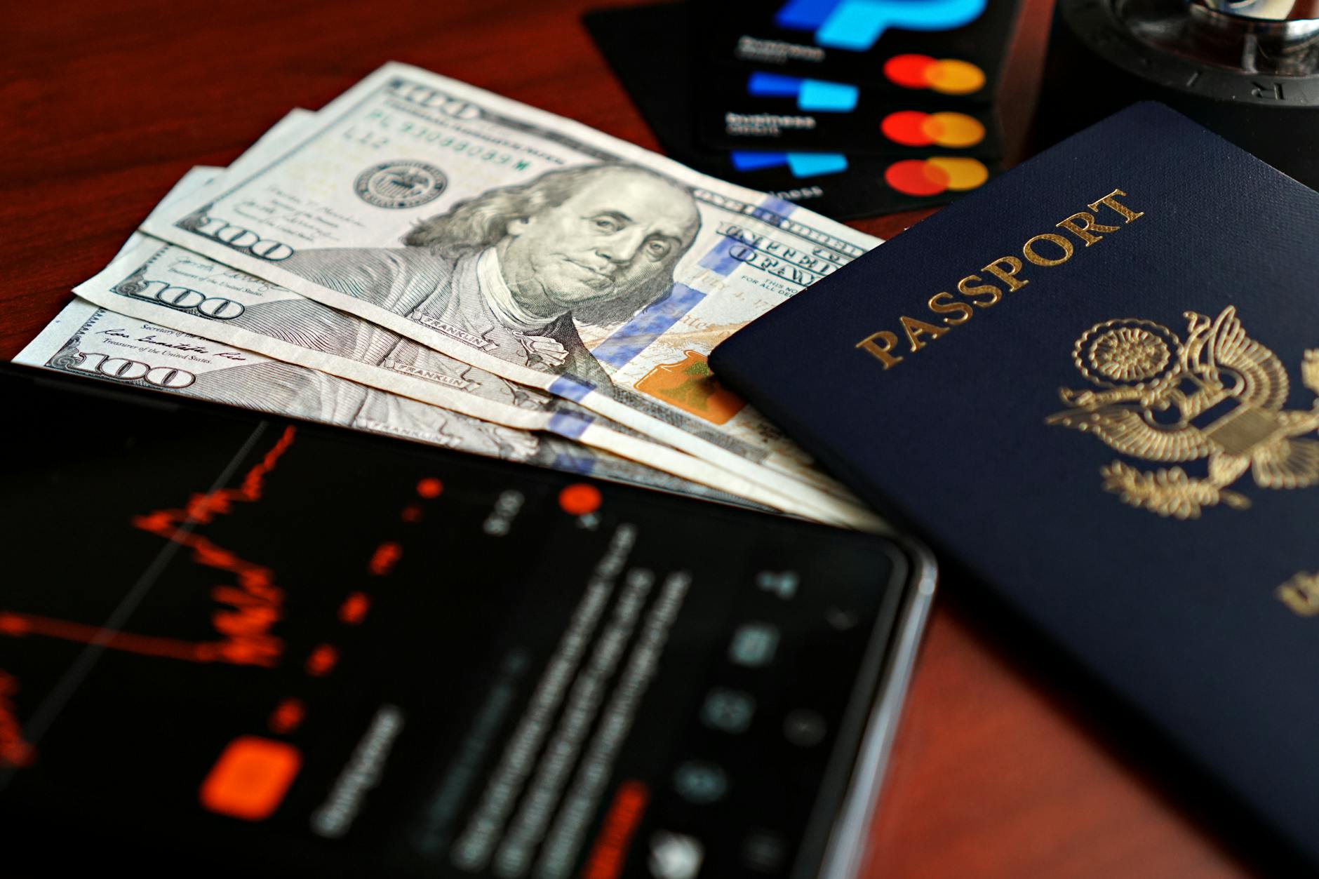 financial planning with passport and currency